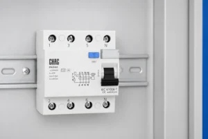 CHAC PXL9-63 RCD installed on a DIN rail in a commercial distribution panel